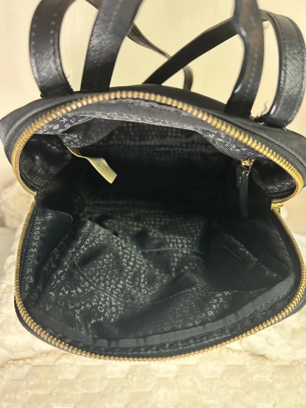 Kate Spade Blake Ave black nylon mini backpack with gold hardware